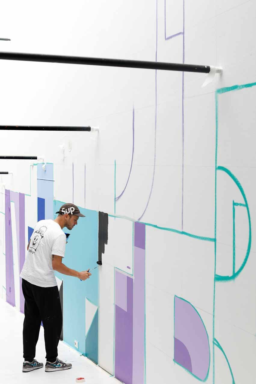 Saïd Kinos, working on his mural 'A Half Truth is a whole Lie', 2019, photo Bas Czerwinski Said Kinos_dag 2_Bas Czerwinski (34)_lowres.jpg
