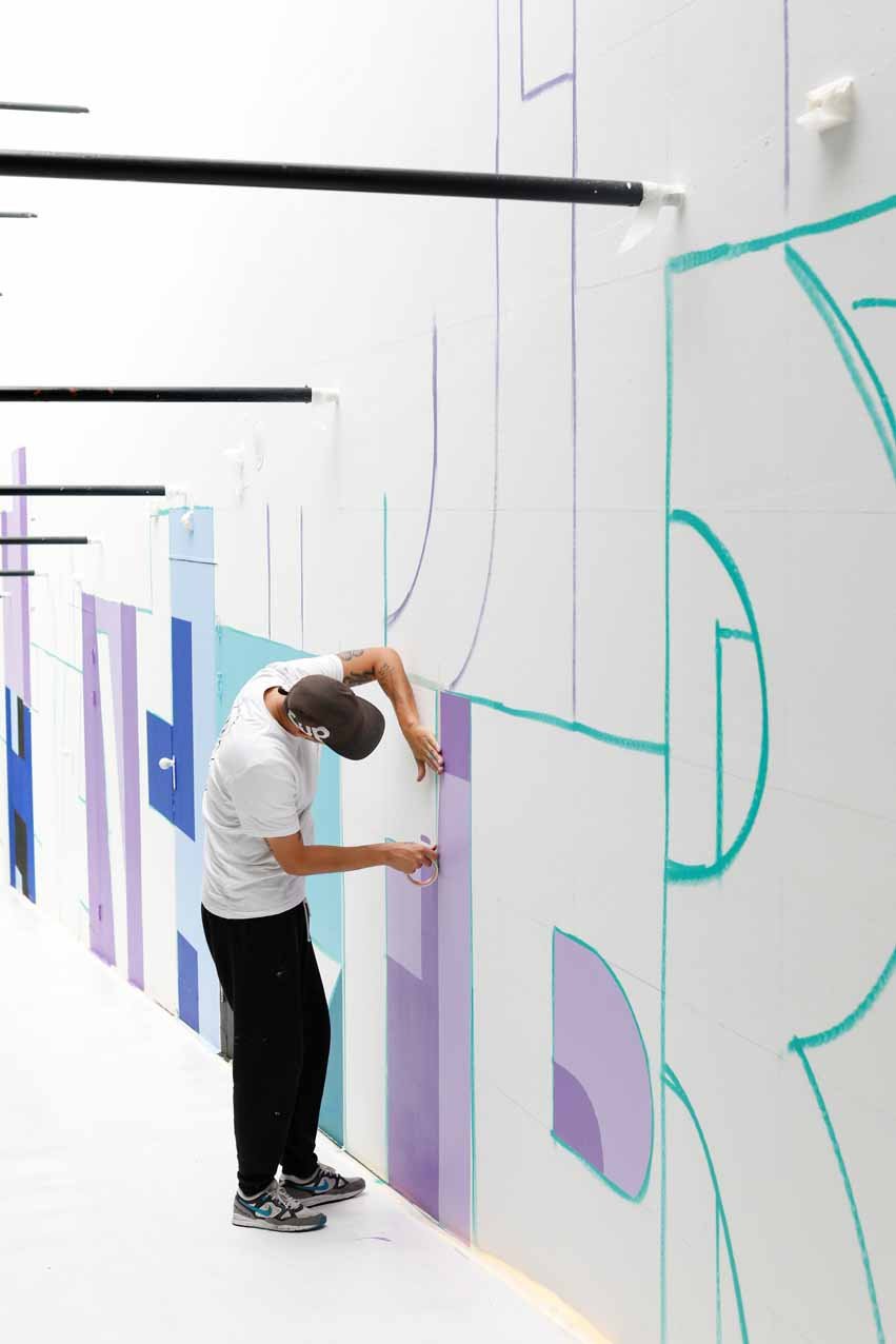 Saïd Kinos, working on his mural 'A Half Truth is a Whole Lie', 2019. Photo Bas Czerwinski Said Kinos_dag 2_Bas Czerwinski (33)_lowres.jpg