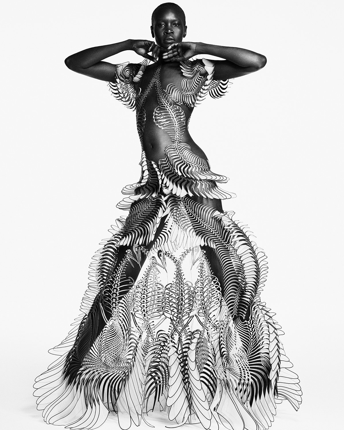 Iris van Herpen. Labyrinthine gown, Sensory Seas collection, Haute Couture spring/summer 2020. 3D lasercut metallic silk dendrites, heatbonded to leaves of white translucent organza. Photo by Luigi & Iango Model: Alek Wek 1..jpg