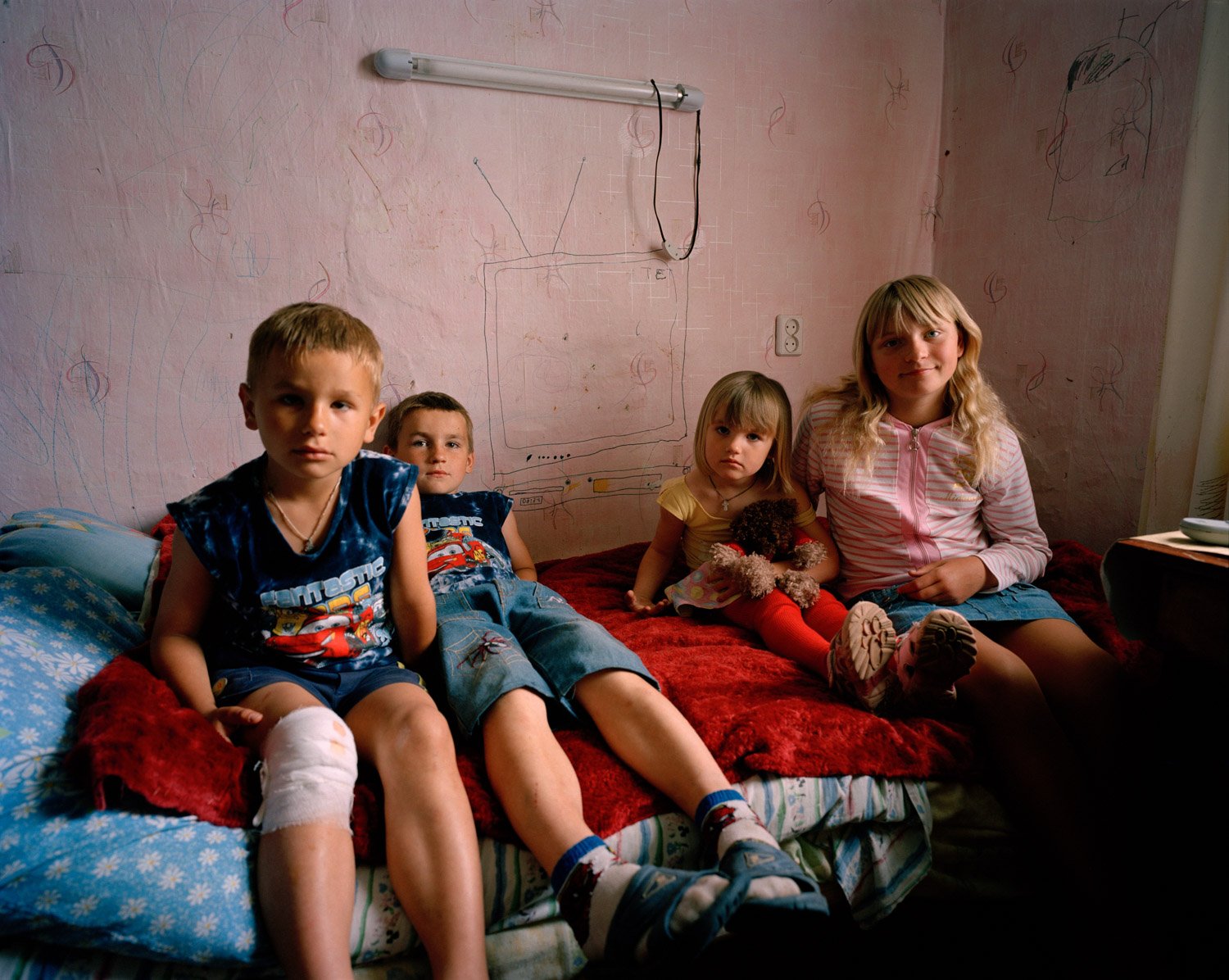 Adopted girl with her cousins, Ukraine 2009 04 - Simon Crofts - Adopted girl with her cousins.jpg